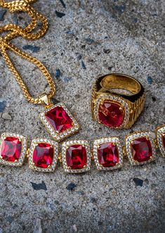 Ruby Royaly Comes With A Gold Plated Ruby Pendant And Franco Chain 4Mm Wide And 24 Inch Long Along With Matching Bracelet 8Mm Wide And 8 Inch Long. The Setup Also Comes With A Ring Size, Which Can Be Selected Up Top. -LIFETIME WARRANTY -LIFETIME UPGRADE -15 DAY MONEY BACK GUARANTEE -FREE SHIPPING -FINANCING AVAILABLE Ruby Chain, Xo Jewelry, Gold Earrings For Men, Mens Diamond Bracelet, Silver Chain For Men, Gold Watches Women, Ruby Bracelet, Mens Gold Rings, Gold Chain With Pendant