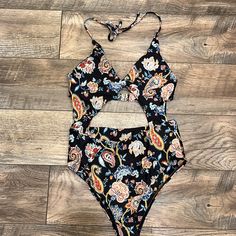 Womens Boho Swim Suit Size Small (4) New With Liner In Bag Shein Brand Beautiful Pattern And Colors, Paisley Floral Boho Print. Really Pretty In Person Halter Tie Top Around Neck, Back Metal Clasp, Cheeky Cut Bottom, One Piece Bathing Suit With Middle Cut Out. Black Color With Reds, Blues, Yellows In N Pattern Casual Black Swimwear With Floral Print, Boho Swim, Brown Swimsuit, Halter Tie Top, Backless One Piece Swimsuit, Blue One Piece Swimsuit, Floral One Piece Swimsuit, Cut Out One Piece, Swimming Bathing Suits