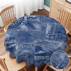 an image of a table made out of jeans on top of a wooden table with chairs around it