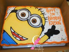 the birthday cake is decorated to look like a minion