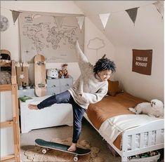 a person jumping on a skateboard in a room with bunk beds and rugs