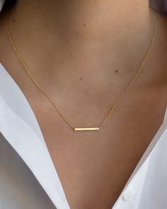 "14K solid gold Bar necklace with a tiny diamond , comes in the gold color of your choice, and length of your choice, dainty and absolutely amazing! The perfect everyday necklace, by itself or layered. made in L.A. Size: Approx. 1\" Diamond: 0.01 ct wt Ships in 5 to 7 business days Comes gift ready in our beautiful branded jewelry box." Minimalist 14k Gold Necklaces For Layering, 14k Gold Bar Necklace With Delicate Chain, Delicate Gold Bar Necklace In 14k, Gold Bar Necklace With Delicate 14k Chain, Gold Bar Necklace With Delicate Chain In 14k Gold, Elegant 14k Gold Filled Bar Necklace, Elegant 14k Gold-filled Bar Necklace, Everyday 14k Gold Bar Necklace With Delicate Chain, Delicate 14k Gold Bar Necklace