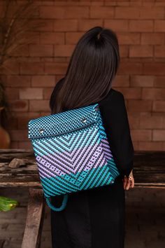 Embark on a journey of colors and textures with our handmade, hand-woven backpack! The black base is the perfect canvas for vibrant shades of blue, lilac and turquoise, highlighting traditional craftsmanship. Cotton handles that are masterfully intertwined in a macramé technique add a bohemian and authentic touch to this unique backpack. Every detail of this backpack radiates the beauty of handmade and craftsmanship, the contrast between colors is harmoniously combined, where each color, size an Rectangular Woven Backpack For Travel, Blue Travel Bag With Weaving Detail, Woven Backpack For Daily Use, Woven Standard Backpack For Daily Use, Bohemian Backpack, Unique Backpacks, Blue Lilac, All About Eyes, Baby Bag