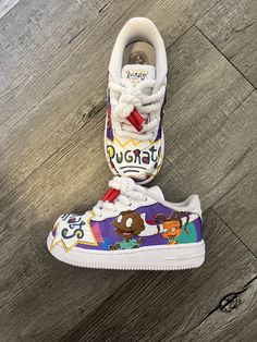 This is a 90's cartoon character AF1. Cartoon Print Sneakers For Streetwear, 90s Cartoon Characters, Sneakers Looks, 90s Cartoon, Sneakers Athletic, Croc Charms, Cartoon Character, Cartoon Characters, Kids Shoes