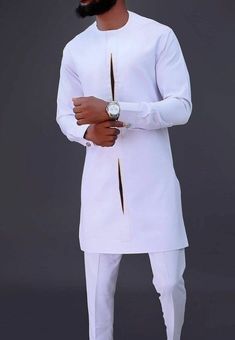 This listing features an Authentic African Shirt made from 100% pure quality fabric with exceptionally accurate neat and durable stitching. This is Ideal for all your formal occasions. You will look natively executive anytime you put on this wear. night. 》Make ●Men's African Shirt ●Versatile and suitable for all occasions and personalities ●Made with your comfort in mind 》Color ●White 》Features ●Round Neckline ●Short Sleeve Length ●Long Tight Fitting ●Executive Finishing ●Regular Fit Suit ●100% Senator Wears, Sets Outfit, Latest African Men Fashion, African Dashiki