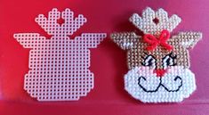 two pieces of bead art on a pink surface with one piece of bead art in the shape of a deer