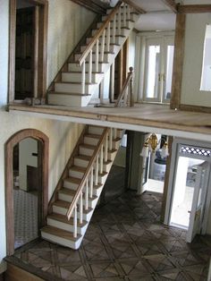 two story house with stairs and tiled floor