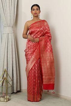 Red banarasi saree featuring zari woven geometric checkered patterns, vine pattern border and pallu with tassels. - Aza Fashions Red Katan Silk Pre-draped Saree For Designer Wear, Designer Red Pre-draped Saree With Self Design, Designer Red Paithani Silk Pre-draped Saree, Red Tussar Silk Designer Pre-draped Saree, Red Tussar Silk Pre-draped Designer Saree, Transitional Red Banarasi Silk Pre-draped Saree, Red Pre-draped Saree With Zari Weaving In Dola Silk, Red Pre-draped Saree With Zari Weaving On Dola Silk, Red Pre-draped Unstitched Saree With Zari Weaving