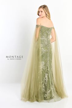 Introducing the Mon Cheri Montage M2204 - a breathtaking masterpiece from the Fall 2023 evening collection. This gown exudes elegance and sophistication, making it the perfect choice for your next special occasion. With its luxurious design and impeccable craftsmanship, you'll feel like royalty as you grace the room. Embrace the allure of timeless beauty and make a statement that will leave everyone in awe. Elevate your style with Mon Cheri Montage M2204. Montage By Mon Cheri, Tulle Cape, Loden Green, Shoulder Cape, Cape Gown, Off Shoulder Gown, Trumpet Gown, Evening Dresses For Weddings, Gown Prom