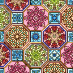 a colorful pattern with many different colors and shapes on it's surface, including the center