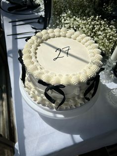 a white cake sitting on top of a table