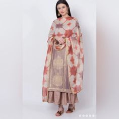 Biba Womens Gorgeous Handcrafted Tie Dye Dupatta With Gota Work Anarkali Inner And Churidhar Pant Chanderi Silk Suit Four Piece Set Size 32 Biba Womens Gorgeous Dual Tone Brown Gold Chanderi Anarkali Inner Which Doubles As A Separate Wear 4 Piece Suit, Churidhar Pant And Handcrafted Tie Dye Print Dupatta With Gota Work. A Straight Cut Top With Gota Work. V Neck, 3/4 Sleeves, Above The Knee Length Suit. It Is Perfectly Stitched And Comfortable Fit Ready To Wear. It Can Be Used For Any Function Li Multicolor Cotton Silk Palazzo Set With Dupatta, Traditional Beige Palazzo Set With Dupatta, Beige Palazzo Set With Sheer Dupatta, Beige Palazzo Set With Dupatta, Traditional Beige Palazzo Set For Festivals, Transitional Multicolor Sharara With Sheer Dupatta, Beige Dupatta For Navratri, Beige Chanderi Sets For Navratri, Traditional Beige Sharara With Sheer Dupatta