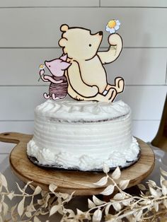 there is a cake with a bear on it