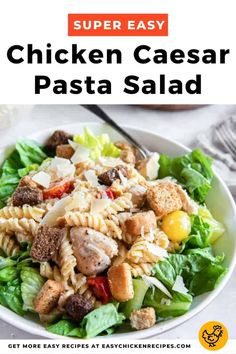 chicken caesar pasta salad with lettuce, tomatoes and cheese in a white bowl