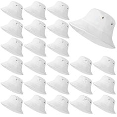 many white bucket hats are lined up in the shape of a triangle, with buttons on each side