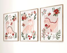 three framed art pieces on the wall with flowers and animals in pink, green, and red colors