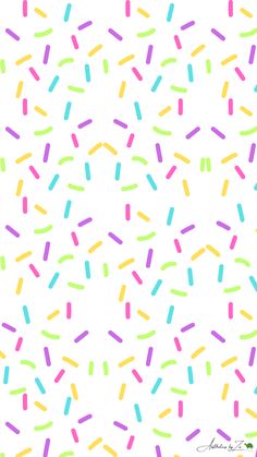 colorful sprinkles on a white background for wallpaper or wrapping paper design