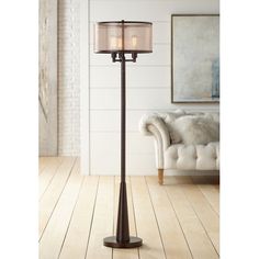 a lamp that is on top of a wooden floor