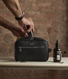 Introducing our Personalised Toiletry Wash Bag - a stylish and practical accessory that adds a touch of individuality to your grooming routine. This initials bag with a monogram is not just a toiletry bag; it's a personalised statement that makes it the perfect gift for groomsmen, a thoughtful Father's Day present, or a versatile cosmetic and makeup bag for everyday use. Crafted with precision and care, this toiletry bag boasts a sleek and compact design, perfect for organizing your grooming ess Functional Bags With Zipper Pocket For Gifts, Modern Bag With Zipper Pocket For Gift, Modern Bag With Zipper Pocket As Gift, Personalized Toiletry Bag, Gift For Groomsmen, Personalized Cosmetic Bags, Vegan Bag, Personalized Gifts For Men, Grooming Routine