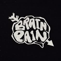 the word brain rain written in white ink on a black background with an arrow pointing to it