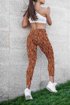 Tiger Pattern Leggings, Bengal Tiger Stripe Leggings, Tiger Print Pants, Animal Print Stretchy Spandex These silky-soft Tiger Pattern Leggings are the perfect women's workout spandex leggings for your yoga class or casual wear. The soft fabric, wide elastic waistband, and flattering fit mean that these leggings are great for evening runs, lounging on the couch, or everything in between. The permanent, vibrant print lasts a long time and won't fade, so these super stretchy performance knit leggin Tiger Print Pants, Stripe Leggings, Tiger Pattern, Pattern Leggings, Bengal Tiger, Spandex Leggings, Women's Workout, Leggings Pattern, Knit Leggings