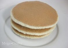 three round sponges on a white plate