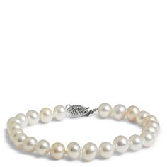 This traditionally-styled and elegant bracelet shows that pearls are for everyone. Made with cultured freshwater pearls with a 14k white gold filigree style clasp, this classic bracelet is perfect for the bride on her special day or any other celebration. Due to the unique nature of pearls, the shade, color shape or texture may vary slightly. Cultured Pearl Bracelet, Classic Bracelets, Freshwater Pearl Bracelet, Unique Nature, Elegant Bracelet, Gold Filigree, Freshwater Cultured Pearls, Color Shapes, Curated Gifts