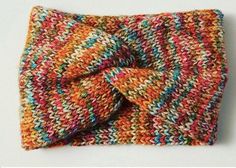 a multicolored knitted scarf with a knot