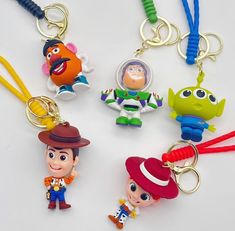 the toy story keychains have been made to look like cartoon characters