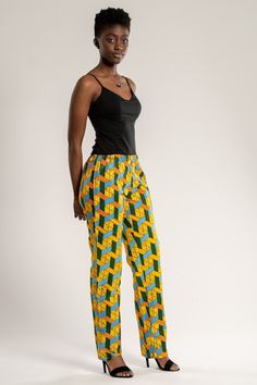 Shine bright like a diamond in our duba African print pants for women. Description: - 2 sides pockets - Elastic waistband pants - 100% cotton Ankara fabric African Pants, Ankara Trousers, African Print Pants, Afrocentric Fashion, African Print Skirt, African Dresses Modern, Waistband Pants, Elastic Waistband Pants, African Print Dresses