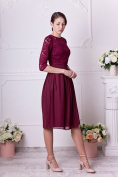 - Knee length burgundy bridesmaid dress - Stretchy floral lace on top - Stretchy lining under the lace - Flowy chiffon skirt with pleats - Thick satin non-see-through lining on skirt - Zipper in side seam, NO BUILT-IN BRA - Sweatheart shaped neckline under the lace, bodice can be fully lined - 3/4 length regular sleeves - Removable chiffon sash - Length 95 cm (37 1/2 inches) fits as knee lenght for 5'7'' (170 cm) - Cutom length available, plus sizes and maternity versions (up to 55 inches in bus Short Burgundy Dress, Bachelorette Dresses, Modest Woman, Bridesmaid Separates, Knee Length Lace Dress, Burgundy Cocktail Dress, Cocktail Dress Short, Burgundy Bridesmaid, Skirt Zipper