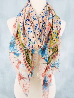 Sarong/Oversized Scarf Pink-Blue Daisy Featuring a stunningly soft and beautiful print, this Sarong/Oversized Scarf in Pink-Blue Daisy is the perfect addition to your wardrobe. Oversized: 37.5'' x 70.5'' 100% Cotton Hand wash; dry flat Super Soft Casual Beige Scarves For Beach, Bohemian Scarves With Floral Print, One Size, One Size Bohemian Scarf With Floral Print, One Size Bohemian Scarves With Floral Print, Bohemian One Size Floral Print Scarves, Bohemian Multicolor Scarves With Abstract Print, Bohemian Multicolor Scarf With Abstract Print, Bohemian One-size Floral Print Scarves, Trendy Beige Scarves For Spring