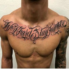 a man's chest with the words tattoo and lettering tattooed on his upper half