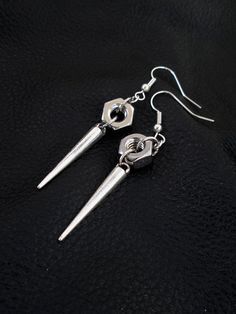 Nut spike earrings, silver tone industrial edgy hardware hex nut spike drop earrings Edgy Jewelry Earrings, Hex Nut Jewelry, Industrial Accessories, Industrial Earrings, Hardware Jewelry, Wire Wrapped Jewelry Diy, Edgy Jewelry, Hex Nut, Goth Jewelry