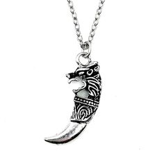 Unleash your wild side with our Wolf Head Tooth Necklace. This striking tribal pendant, crafted from high-quality silver plated materials, is designed for those who embrace the gothic and punk aesthetics. Key features: - Unique wolf head tooth design - Silver plated finish for lasting shine - Perfect amulet for boys and men - Ideal for gifting on special occasions Let this eye-catching piece be a conversation starter and a reflection of your fierce spirit. Measuring approximately 2 inches in len Punk Aesthetics, Tooth Design, Tooth Necklace, Wolf Head, Men Jewelry, Pendant Silver, Design Silver, Le Point, Halloween Shopping