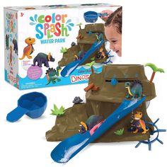 the dinosaur water park playset is in front of a box with it's contents