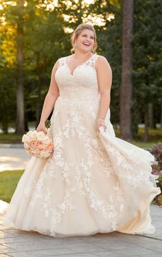 a woman in a wedding dress is walking down the street