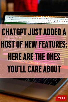 a laptop computer sitting on top of a wooden table next to a pink sign that says, chatgt just added a host of new features here are the ones you'll