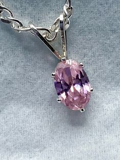 October birthstone, beautiful, sparkly pink cubic zirconia necklace. 7mm x 5mm pink cz hand set in 6 prong sterling silver pendant. Pink cz pendant comes on an 18 inch sterling silver figaro chain. Gemstone is 3/4 carat total weight. This pink cz necklace is a perfect gift idea! This gorgeous necklace comes in a gift box and is ready to be given to that special someone. Great gift idea for a birthday, an anniversary, Valentine's Day or any occasion. Great for mothers, sisters, daughters or frien October Jewelry, Pink Tourmaline Necklace, Pink Pendant Necklace, Pyramid Necklace, Silver Figaro Chain, October Gifts, October Birthstone Necklace, Pink Pendant, Birthday Necklace