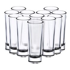 six glasses are lined up in a row