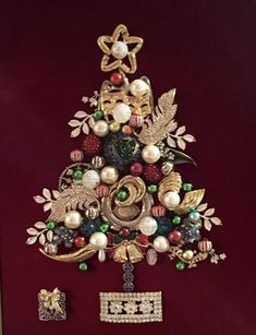 a christmas tree made out of brooches and beads