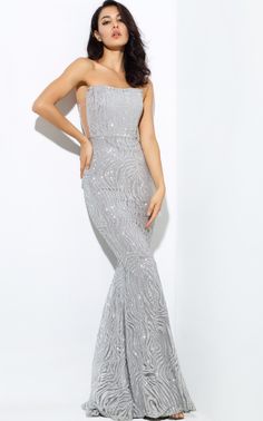 Luxury Silver Maxi Length Gown, Luxury Silver Sleeveless Sequin Dress, Luxury Silver Strapless Evening Dress, Luxury Silver Lace Dress, Luxury Silver Gown For Formal Occasions, Luxury Silver Sequined Mother Of The Bride Dress, Luxury Silver Gown For Festive Season, Luxury Silver Sequin Summer Dress, Silver Sequin Formal Long Dress