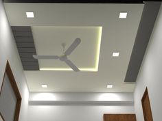 a ceiling fan mounted to the ceiling in a room