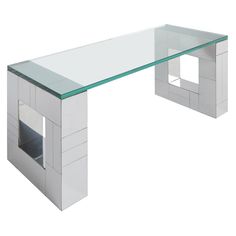 a modern glass and metal desk on white background