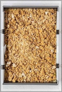 a pan filled with food sitting on top of a counter