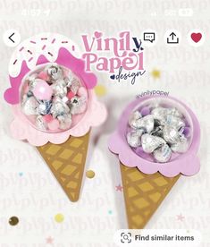 two ice cream cones with candy in them