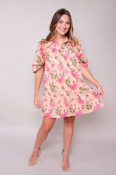 Step into summer with our Peachy Breeze Dress—a charming addition to your wardrobe that embodies the essence of blooming tropic and gentle breezes. Crafted from a lightweight printed woven fabric, this mini dress features a classic shirt collar and short puff sleeves, evoking a sense of vintage-inspired elegance. Self: 100% Polyester Lining: 100% Polyester Hand Wash Cold Colors may vary with different viewing devices. Summer Short Sleeve Shirt Dress For Brunch, Short Sleeve Shirt Dress For Summer Brunch, Short Sleeve Shirt Dress For Brunch, Summer Short Sleeve Shirt Dress For Spring, Short Sleeve Shirt Dress For Spring And Summer, Short Sleeve Shirt Dress For Spring, Summer Vacation Floral Print Shirt Dress, Summer Floral Print Shirt Dress, Breezy Short Sleeve Mini Dress