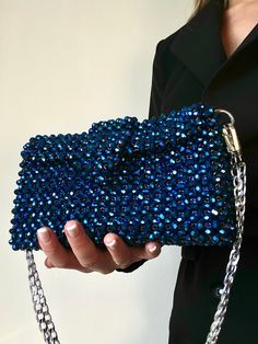 This handmade blue bag will complete your look. Made with blue crystal beads. The bag has a blue lining and silver fittings, comes with silver chain 1.1 m. Bag dimensions: -Height - 12 cm -Width-20 cm, -Depth 6 cm This model can FITS: - Iphone - car keys - headphones - cardholder - lipstick - antiseptic The bag is very durable. It is ideal for any occasion and for those who love handmade accessories. Crystal Bead Bag, Bead Bag, Crystal Bags, Pearl Bag, Beaded Bag, Bag Luxury, Beaded Purses, Purse Patterns, Beaded Bags