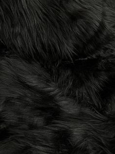 an animal fur texture is shown in black