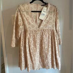 Nwt Zara Trf Collection Blush Pink Eyelet Romper Dress, Three Quarter Sleeve And Empire Waist Fit. Size Xs , Approximately 16 Inches Across Empire Waist Line Under Chest And 29 Inches From Top Of Shoulder To Bottom Hem. Bottom Lining Underneath Is Shorts. New Condition. Zara Jumpsuit, Zara Pants, Romper Dress, Three Quarter Sleeves, Quarter Sleeve, Empire Waist, Three Quarter, Blush Pink, Pant Jumpsuit